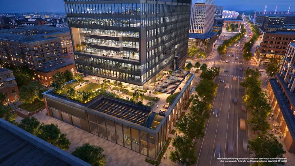 A building with an outdoor deck built into it sits next to a street in a conceptual rendering.