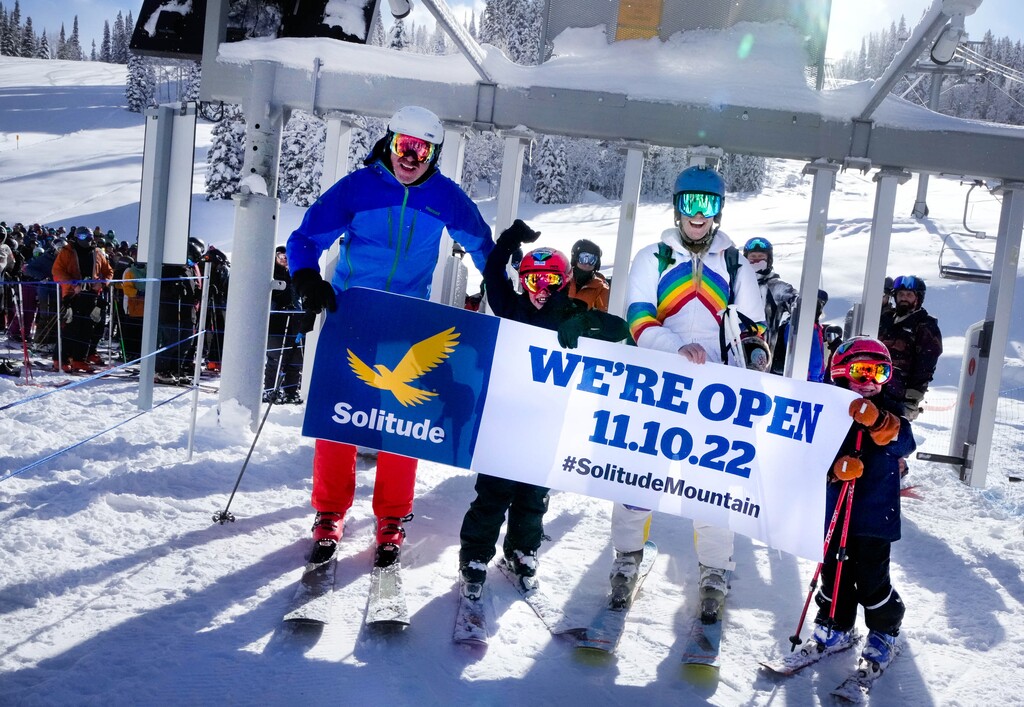 (Francisco Kjolseth | The Salt Lake Tribune) Shawn McPherron, left, joins Liz Dean and her two boys Rainier, 7, and Theodore, 5, for first chair as skiers and snowboarders enjoy opening day at Solitude Mountain Resort Thursday Nov. 10, 2022.