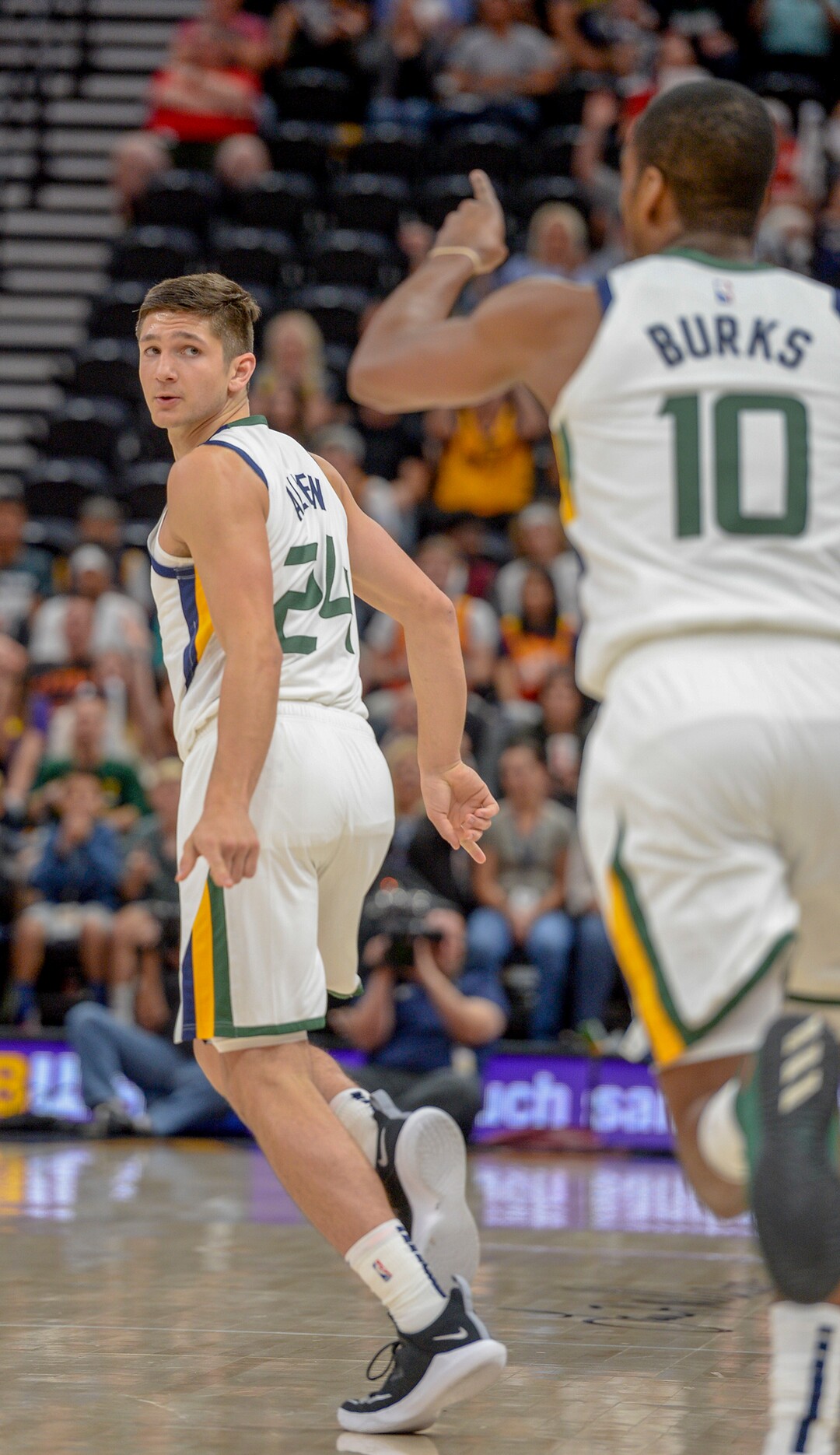 Leah Hogsten  |  The Salt Lake Tribune  Utah Jazz guard Grayson Allen (24) celebrates with Utah Jazz guard Alec Burks (10) on the assist of a 3-pointer for Allen's first bucket of the night in the first half as the Utah Jazz host the Perth Wildcats during their preseason game, Sept. 29, 2018 at Vivint Smart Home Arena.