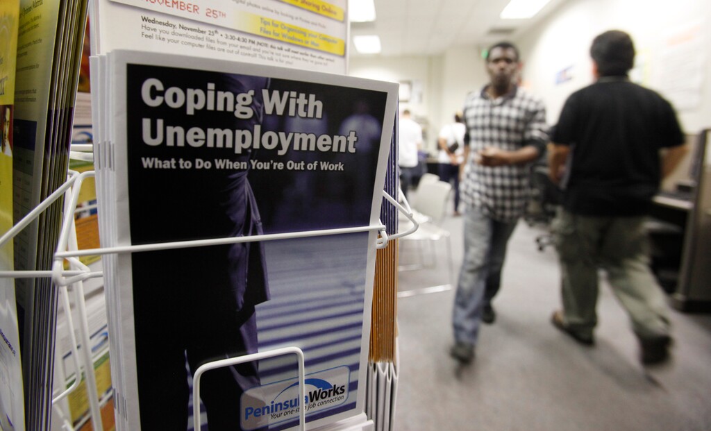 (Paul Sakuma | AP file photo)  In this July 20, 2010, photo, people arrive to seek employment opportunities at a JobTrain office in Menlo Park, Calif.