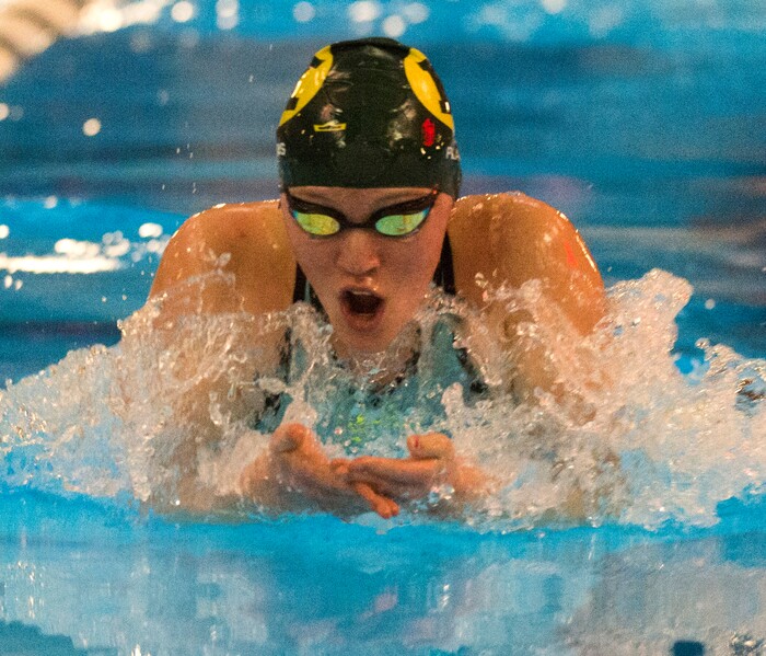 (Rick Egan  |  The Salt Lake Tribune)    Kearns Swimmer, Lily Plaudis, places first in the Women's 100 Yard Breaststroke, in 6A State Swimming Championships in Bountiful, Friday, February 9, 2018.