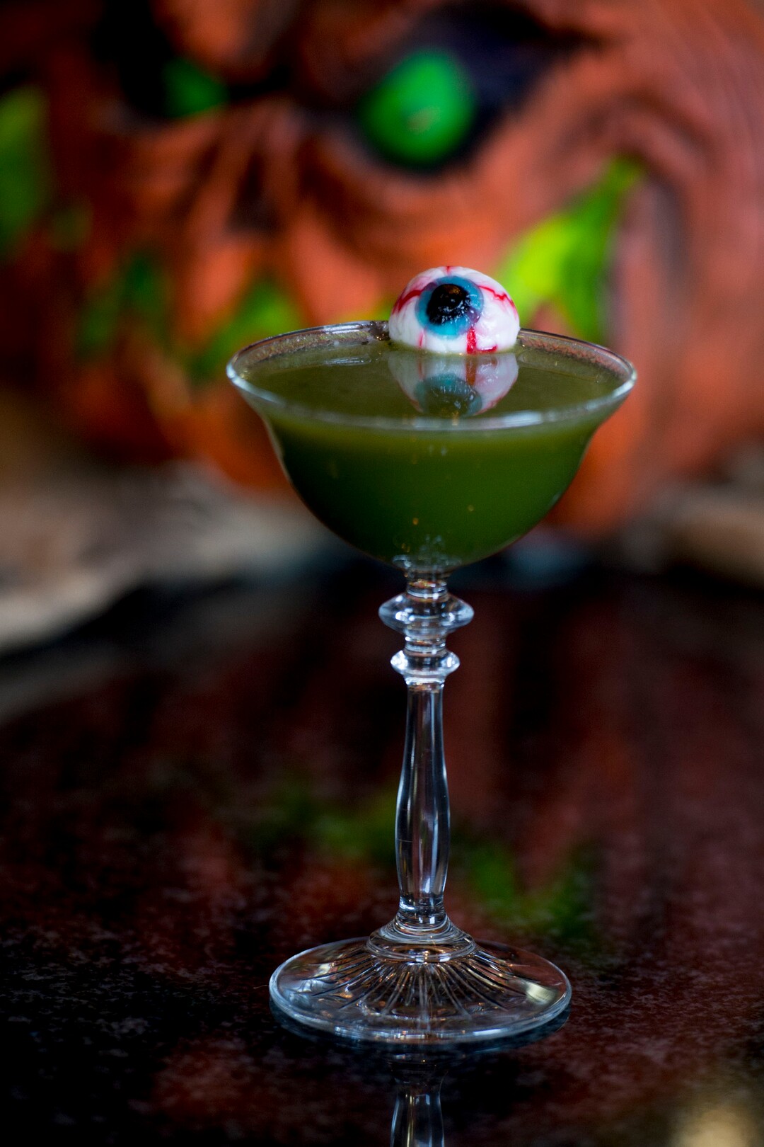 (Jeremy Harmon  |  The Salt Lake Tribune) A special "Medusa's Eye" cocktail is seen at the Vault Bar at Hotel Monaco on Tuesday, Oct. 15, 2019. The downtown Salt Lake City bar has partnered with Nightmare on 13th haunted house to create a Halloween themed experience for bar patrons and is offering cocktails like this one through October.