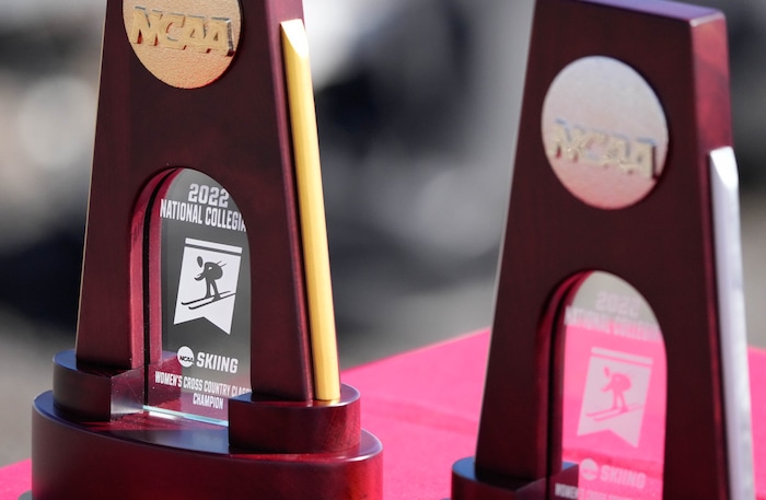(Francisco Kjolseth | The Salt Lake Tribune) Trophies await the awards ceremony as the University of Utah women take first, second and sixth place in the women’s 5K classic in the NCAA Skiing Championships held at the Soldier Hollow Nordic Center on Thursday, March 10, 2022 in Midway, Utah. 

