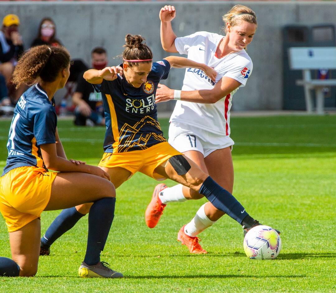 (Rick Egan  |  The Salt Lake Tribune)  Utah Royals FC midfielder Vernica Boquete (21) goes for the ball as OL Reign FC midfielder Danielle Weatherholt (17) defends, in soccer action between Utah Royals FC and Ol Reign FC at Rio Tinto Stadium in Sandy, Saturday, Sept. 26, 2020.