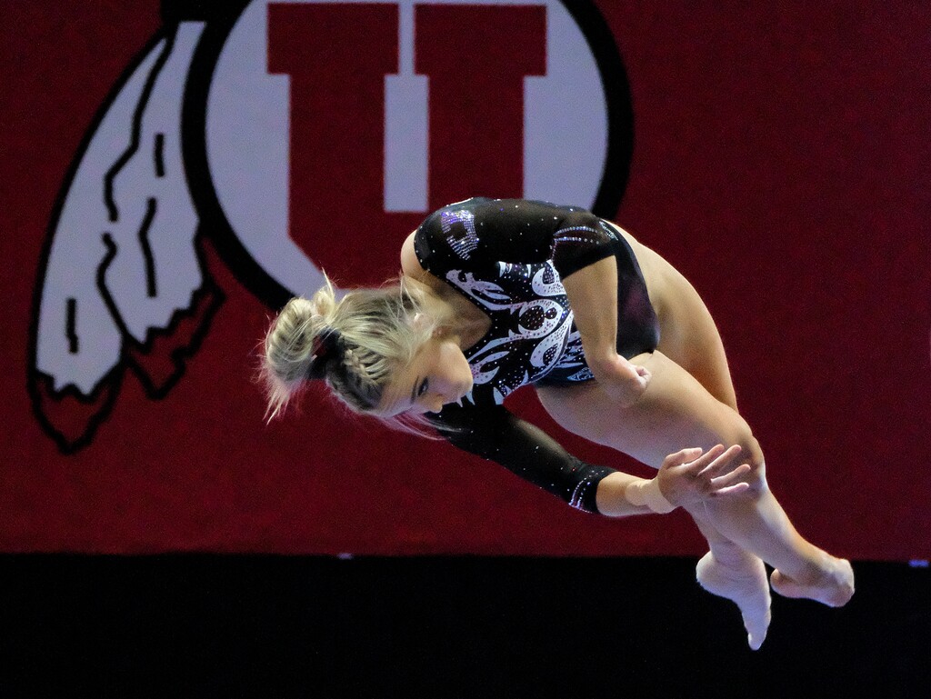 (Leah Hogsten | The Salt Lake Tribune) Utah’s Adrienne Randal performs her routine on beam on Friday, March 12, 2021. The Red Rocks defeated Utah State 197.275 to 196.5 in their regular-season finale at the Jon M. Huntsman Center.