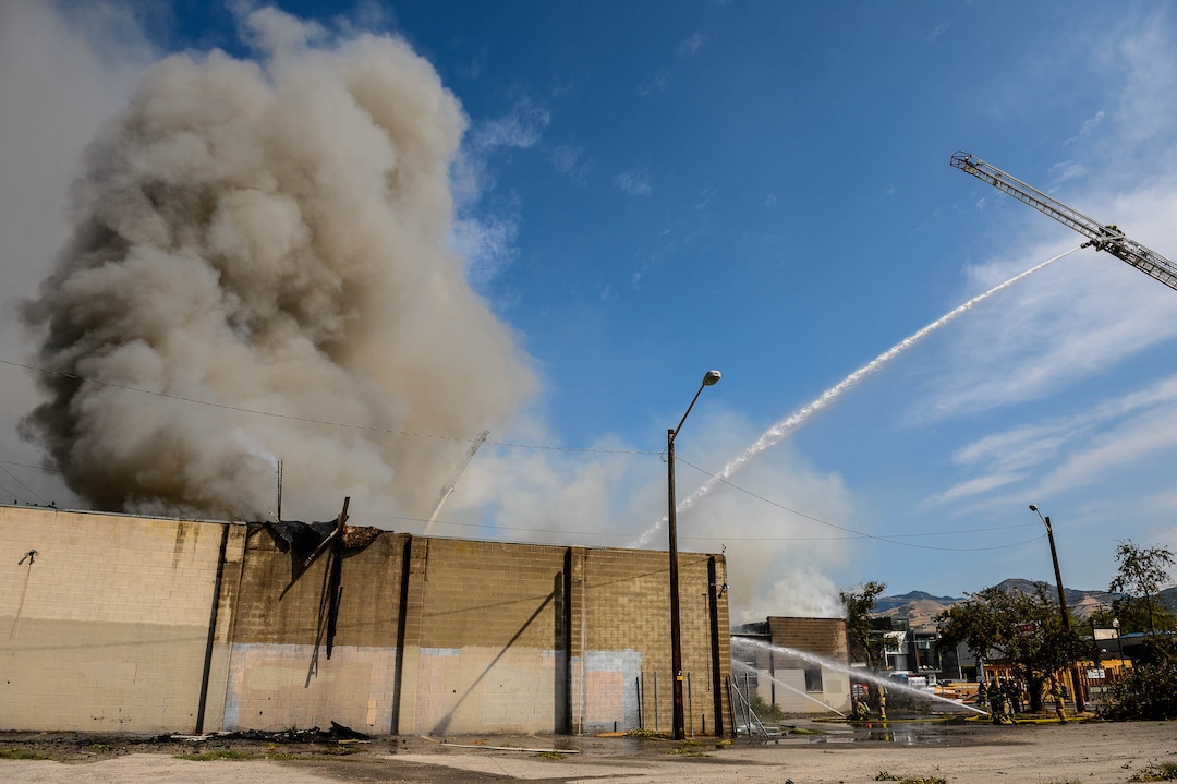(Trent Nelson  |  The Salt Lake Tribune) Crews work to extinguish a fire at 800 South 200 West in Salt Lake City on Wednesday, Sept. 9, 2020.