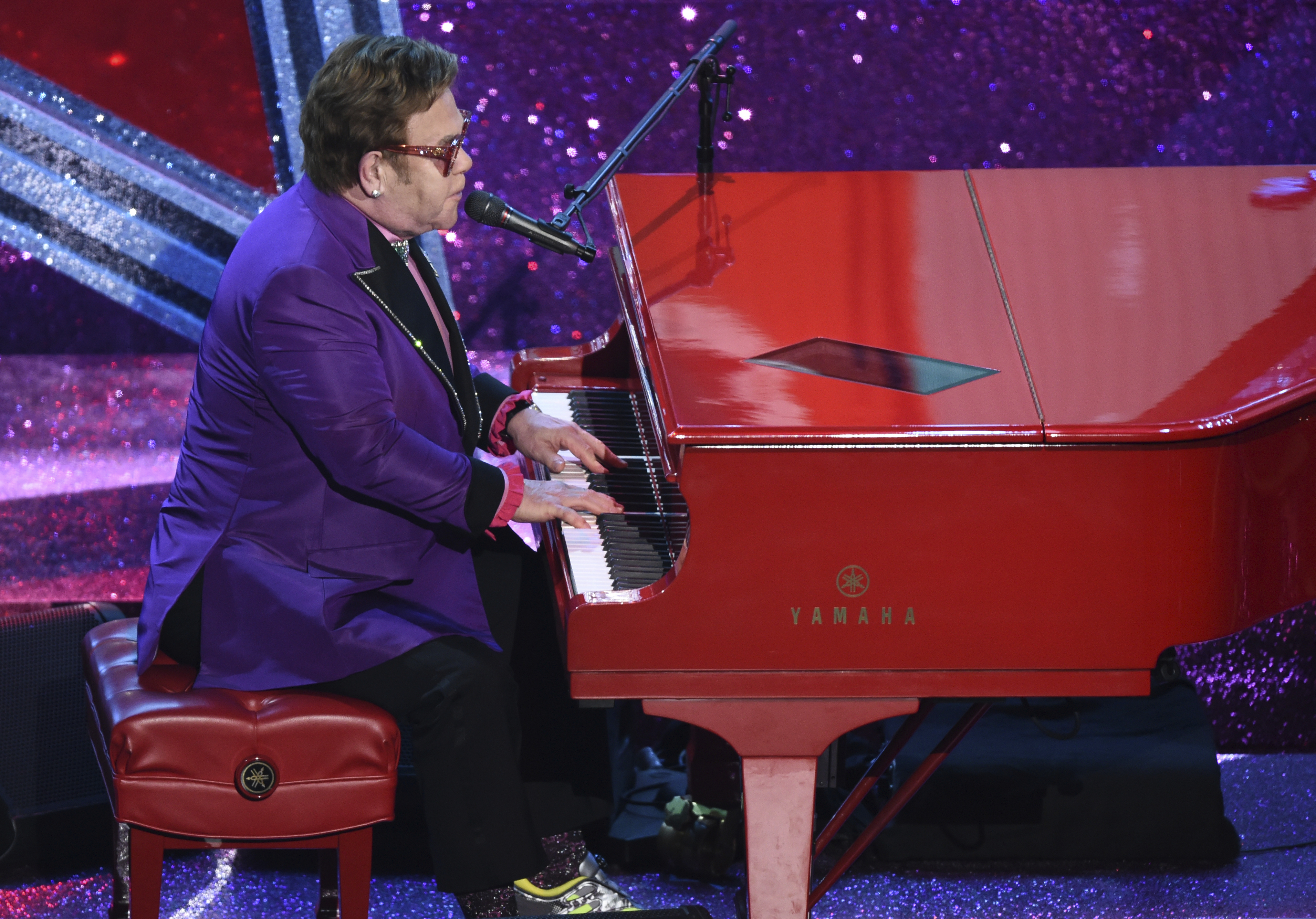 (Chris Pizzello | AP)  Elton John performs "(I'm Gonna) Love Me Again" nominated for the award for best original song from "Rocketman" at the Oscars on Sunday, Feb. 9, 2020, at the Dolby Theatre in Los Angeles.