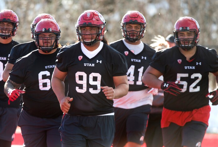 (Rick Egan  |  The Salt Lake Tribune)    Utah defensive lineman Leki Fotu (99), works out with the team, on the first day of Spring practice, Monday, March 5, 2018.



