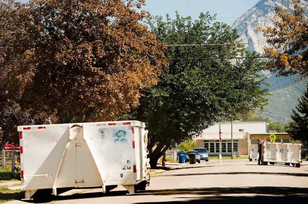 (Rick Egan | The Salt Lake Tribune) Waste and recycling dumpsters outside an elementary school in Sandy, Utah on Thursday, September 11, 2014.