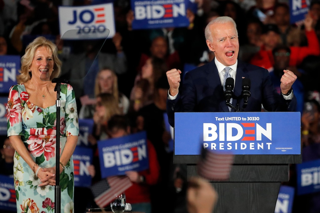 (Gerald Herbert | AP file photo) In this Feb. 29 photo, Democratic presidential candidate former Vice President Joe Biden, accompanied by his wife Jill Biden, speaks at a primary night election rally in Columbia, S.C.