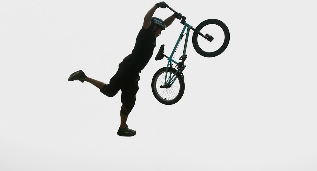 (Rick Egan | The Salt Lake Tribune) Justin McCarty performs a trick in the air, during the BMX Stunt Show, at the Davis County Fair in Farmington, Saturday, Aug. 18, 2018.