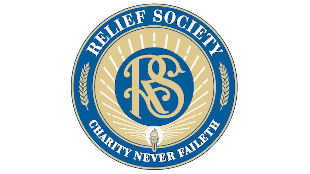 (The Church of Jesus Christ of Latter-day Saints) The women's Relief Society logo displays the organization's motto, Charity Never Faileth.