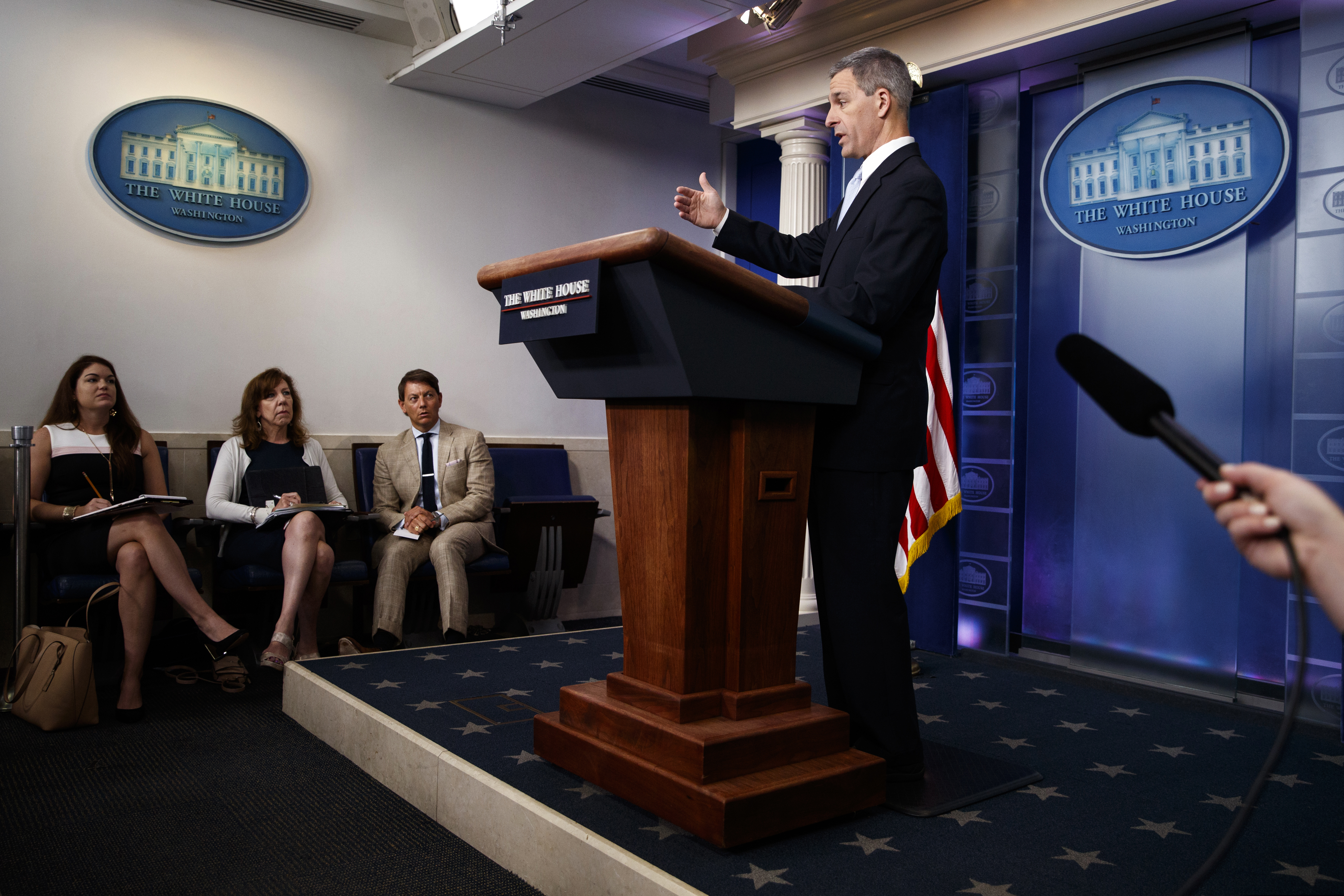 (Evan Vucci | AP) Acting Director of United States Citizenship and Immigration Services Ken Cuccinelli, speaks during a briefing at the White House, Monday, Aug. 12, 2019, in Washington.