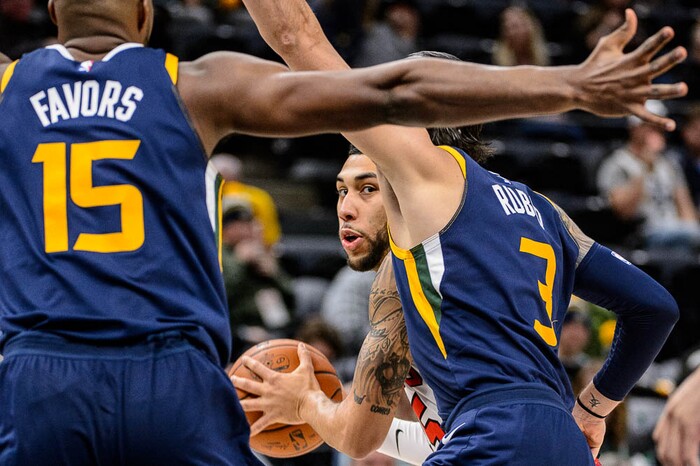 (Trent Nelson | The Salt Lake Tribune)  Chicago Bulls forward Denzel Valentine (45) is defended by Utah Jazz forward Derrick Favors (15) and Utah Jazz guard Ricky Rubio (3) as the Utah Jazz host the Chicago Bulls, NBA basketball in Salt Lake City Wednesday November 22, 2017.