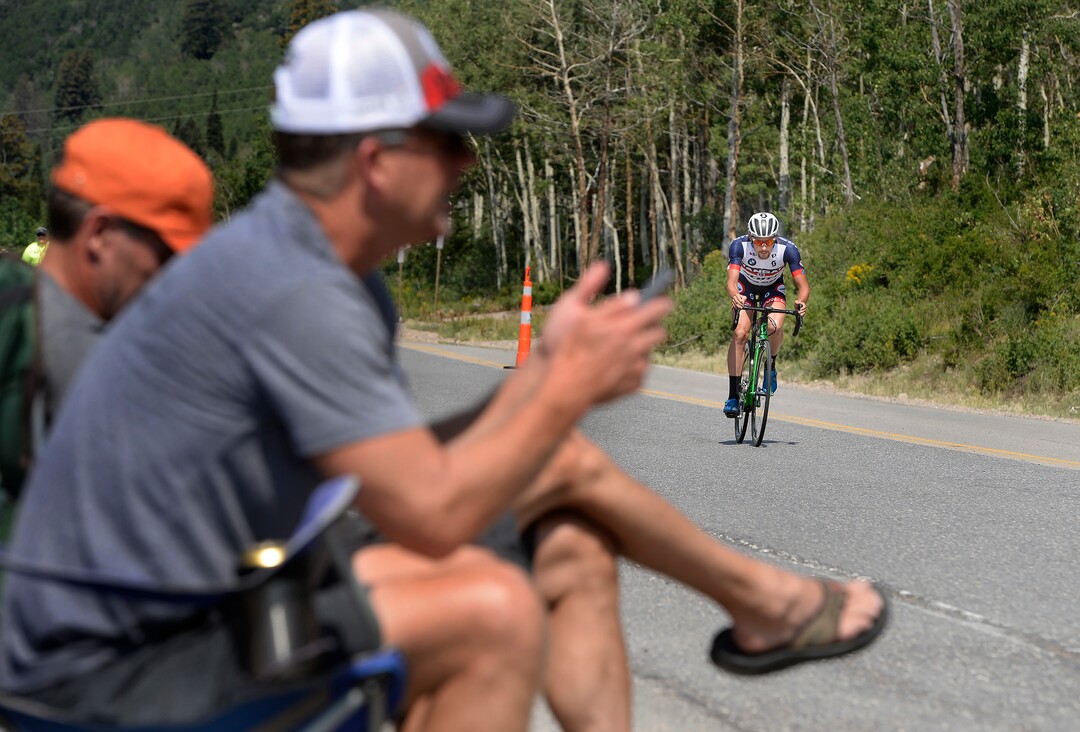(Scott Sommerdorf   |  The Salt Lake Tribune)   Fans who set up their chairs near the Silver Fork Grill watch riders pass as they keep track on the race app during Stage 3 of the Tour of Utah in Big Cottonwood Canyon, Wednesday, August 2, 2017.  