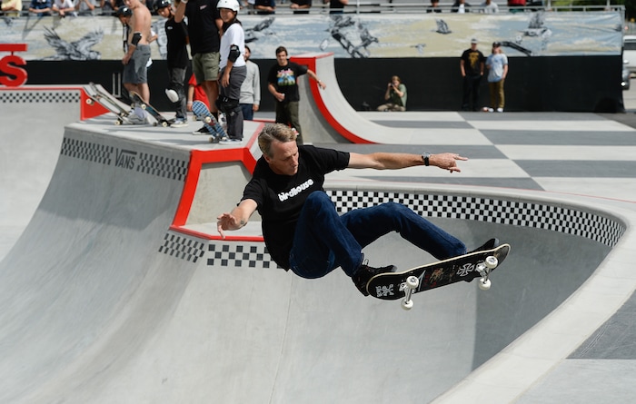 (Francisco Kjolseth  |  The Salt Lake Tribune)  Skate legend Tony Hawk delights the crowd as he drops in for a round of tricks along with other pro skaters gathered for a community skate and first look of the new Vans - Utah Sports Commission Skatepark at the Utah State Fairpark on Tuesday, Sept. 3, 2019.