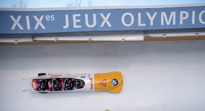 (Rick Egan  |  The Salt Lake Tribune)  The Rico Peter Switzerland team takestheir first run in the BMW IBSF World Cup 4-Man Bobsleigh competition, Saturday, November 18, 2017.