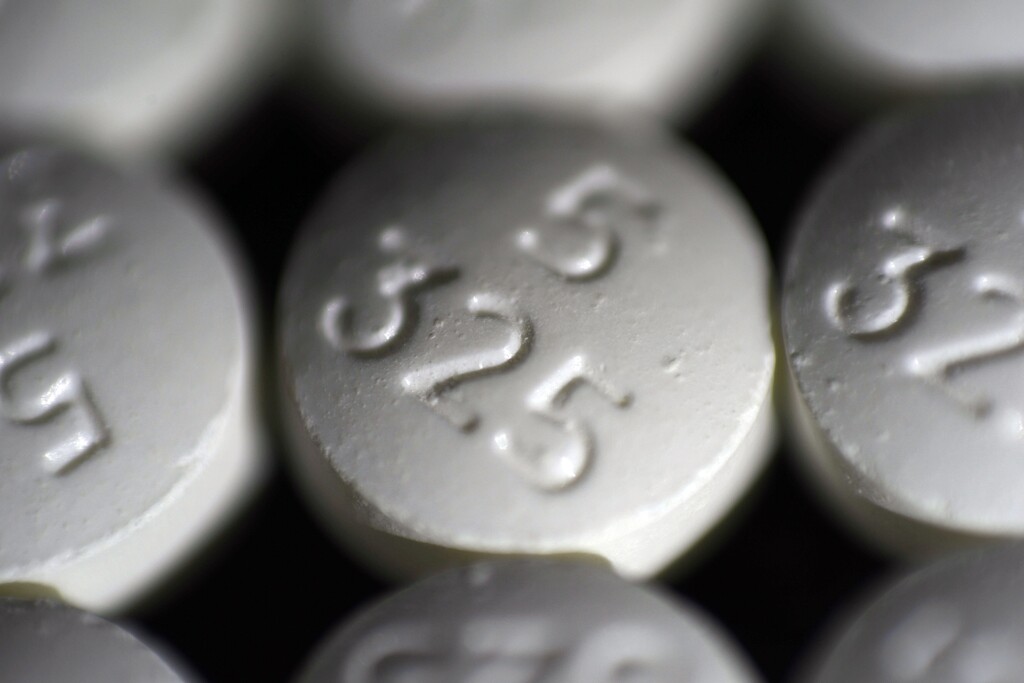 FILE - This Tuesday, Aug. 15, 2017, file photo shows an arrangement of pills of the opioid oxycodone-acetaminophen in New York. Walmart is helping customers get rid of leftover opioids by giving them packets that turn the addictive painkillers into a useless gel. (AP Photo/Patrick Sison, File)