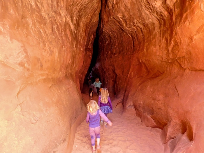 (Erin Alberty|The Salt Lake Tribune) Hikers approach a narrow part of Leprechaun Canyon on April 29, 2017.
