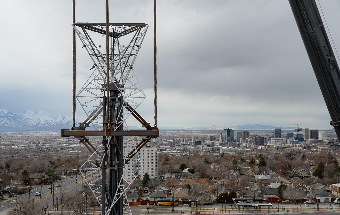 (Francisco Kjolseth  |  The Salt Lake Tribune) The Olympic cauldron is returned to the University of Utah on Friday, Jan. 29, 2021, after a refurbishment to lengthen its life span. Removed in February 2020, the cauldron was transported to an off-site location, where all 738 glass panes were removed and the complete structure was sandblasted and refinished. The refurbished structure was placed on a newly constructed, 17-foot-tall pedestal, just north of the stadium ticket office, with plans to add high-quality glass.