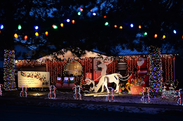 (Scott Sommerdorf | The Salt Lake Tribune)
A view of some of the houses on Royalwood Drive in Taylorsville, Friday, December 22, 2017. "Christmas Street" is a Taylorsville neighborhood where residents up and down the street decorate their homes every year with Christmas lights. The United States uses more electricity for Christmas lights than some countries use all year.
