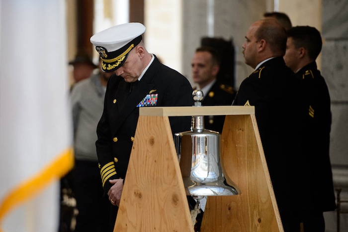 (Trent Nelson | The Salt Lake Tribune)  
Captain Todd Vandergrift rings the Bennion Bell, named after Captain Mervyn Bennion, a veteran of World War 1, who died at Pearl Harbor. Commemoration of WW1 Armistice 100th Anniversary, in Salt Lake City on Thursday Nov. 8, 2018.