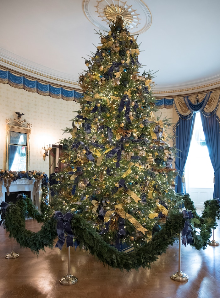 The official White House Christmas tree is seen in the Blue Room during a media preview of the 2017 holiday decorations at the White House in Washington, Monday, Nov. 27, 2017. (AP Photo/Carolyn Kaster)