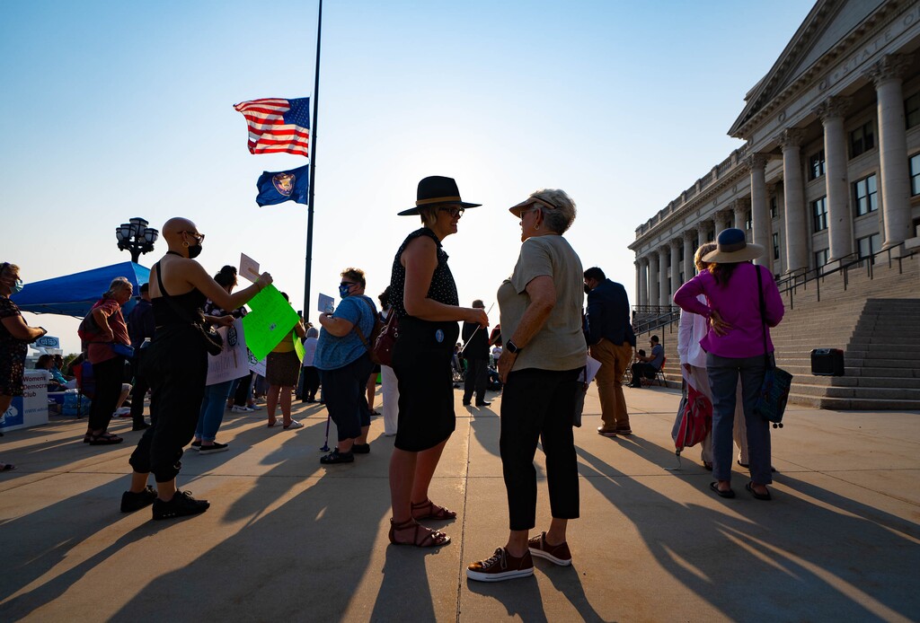 (Francisco Kjolseth | The Salt Lake Tribune) People rally on Women’s Equality Day at the Capitol on Thursday, Aug. 26, 2021, to encourage Utah to ratify the Equal Rights Amendment, as flags are lowered to half staff following the attacks in Afghanistan. 