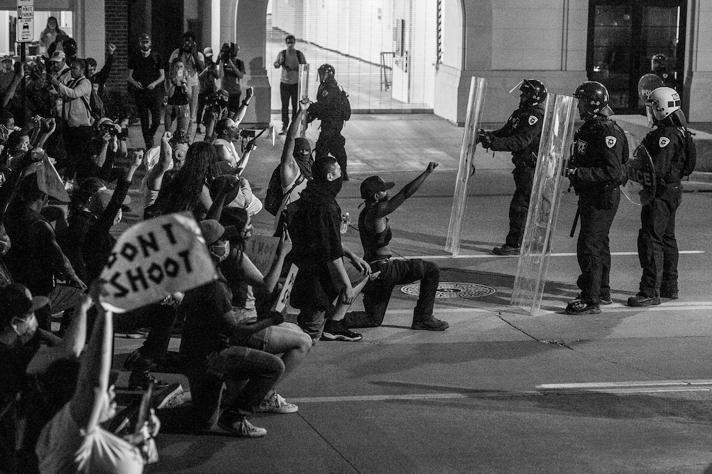 (Trent Nelson  |  The Salt Lake Tribune) Protesters stand off with police while marching through Salt Lake City on Monday, June 1, 2020.