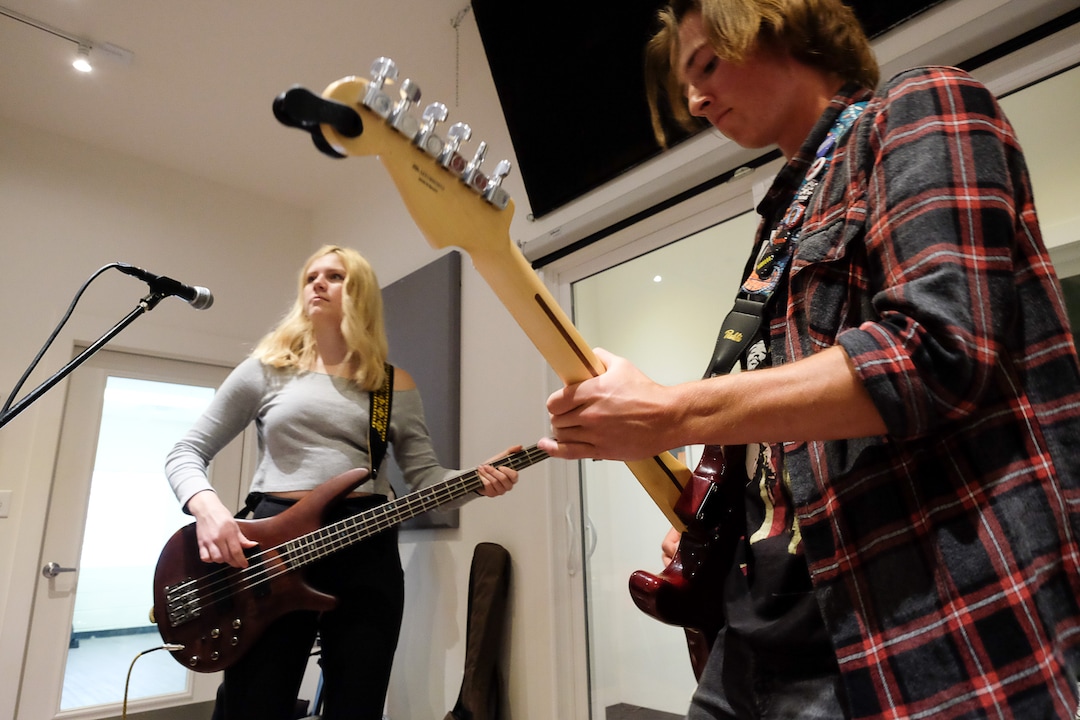 (Francisco Kjolseth  |  The Salt Lake Tribune)  Students Tallulah Schweitz, 16, left, and Connor Bliss, 17, play a little Nirvana together at MusicGarage.org, in Sugarhouse on Monday, May 20, 2019, as they learn to rock and roll in hopes of joining a kids band to perform at festivals this Summer.