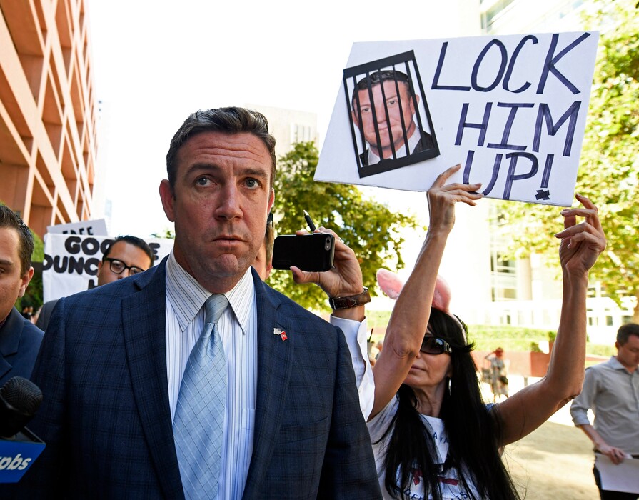 (Denis Poroy | AP file photo) File) In this July 1, 2019, file photo, U.S. Rep. Duncan D. Hunter, R-Calif., leaves federal court after a hearing in San Diego.