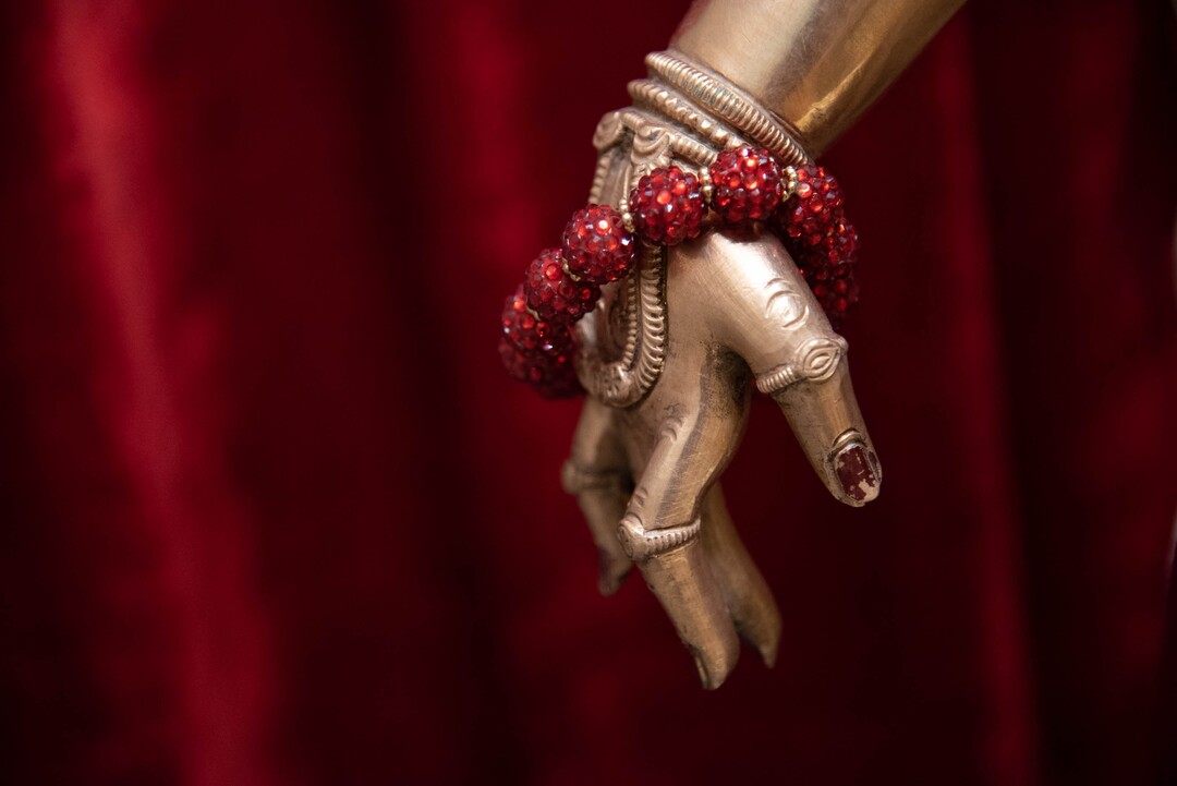 (Francisco Kjolseth  |  The Salt Lake Tribune) Colorful vestige and jewelry adorns a shrine of Sri Andal as Hindus cope with the coronavirus pandemic by limiting visitors to the Sri Ganesha Hindu Temple in South Jordan and broadcast daily ceremonies online.