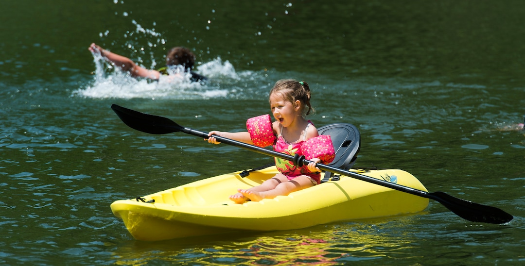 (Rick Egan  |  The Salt Lake Tribune)   Cate Camilo paddles around Farmington Pond, in a kayak, as they float on Farmington Pond, Thursday, July 26, 2018.