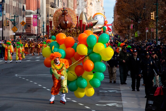 (Eduardo Munoz Alvarez | AP) A clown with balloons fights with winds as it make its way down Columbus Circle during the Macy's Thanksgiving Day Parade, Thursday, Nov. 28, 2019, in New York.