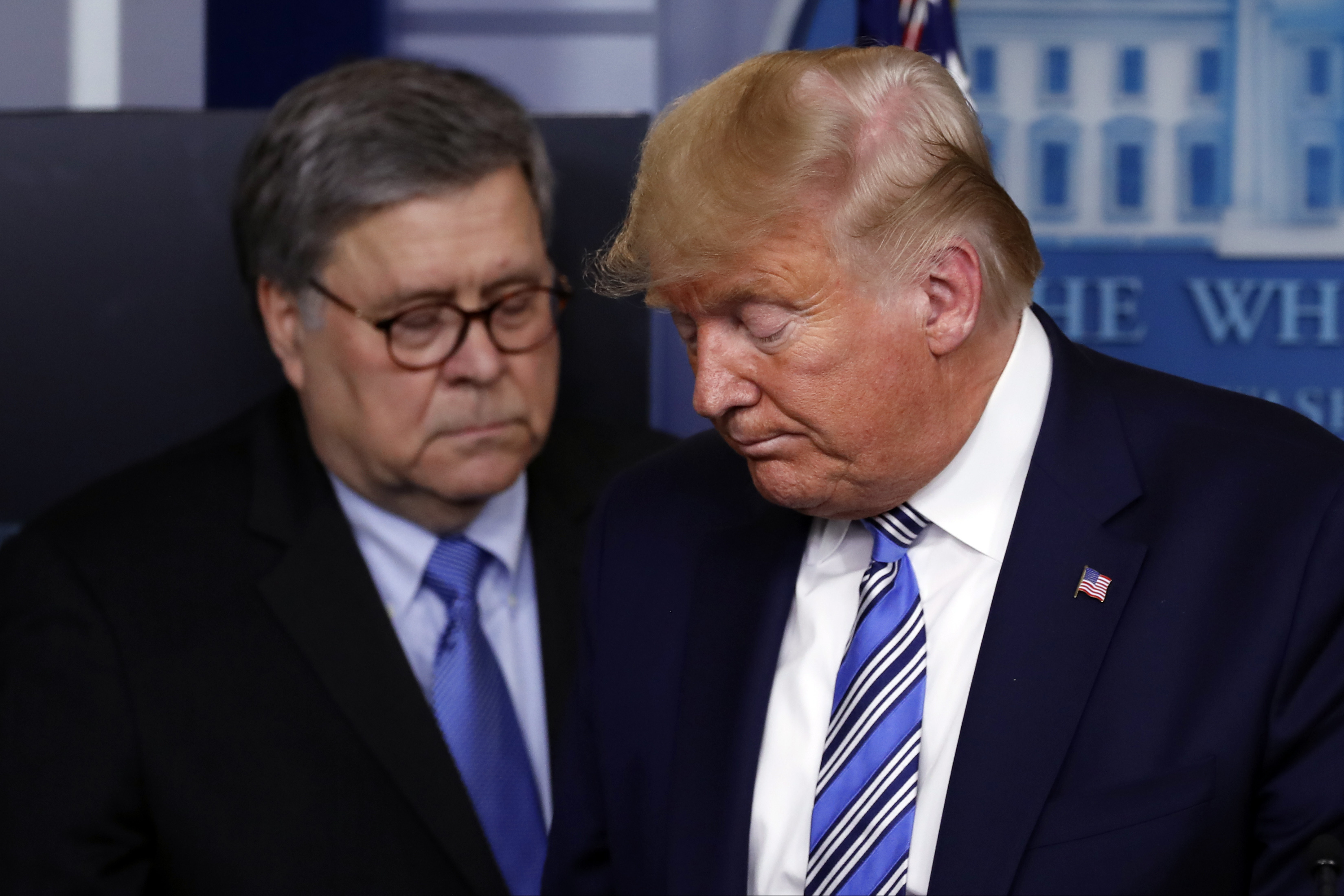 (Alex Brandon | AP file photo)

In this March 23 photo, President Donald Trump moves from the podium to allow Attorney General William Barr to speak about the coronavirus in the James Brady Briefing Room in Washington.