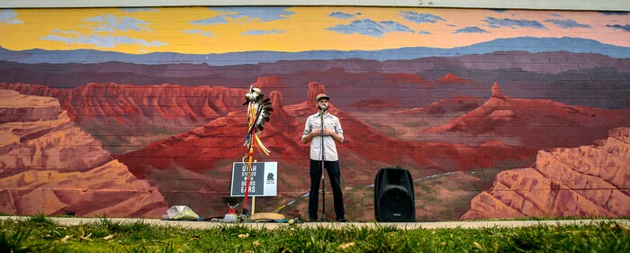 (Steve Griffin  |  The Salt Lake Tribune) Utah graphic artist Josh Scheuerman stands in front of his mural of landscapes from Bears Ears National Monument during a dedication ceremony on 800 South near 300 West in Salt Lake City on Friday, Nov. 24, 2017.