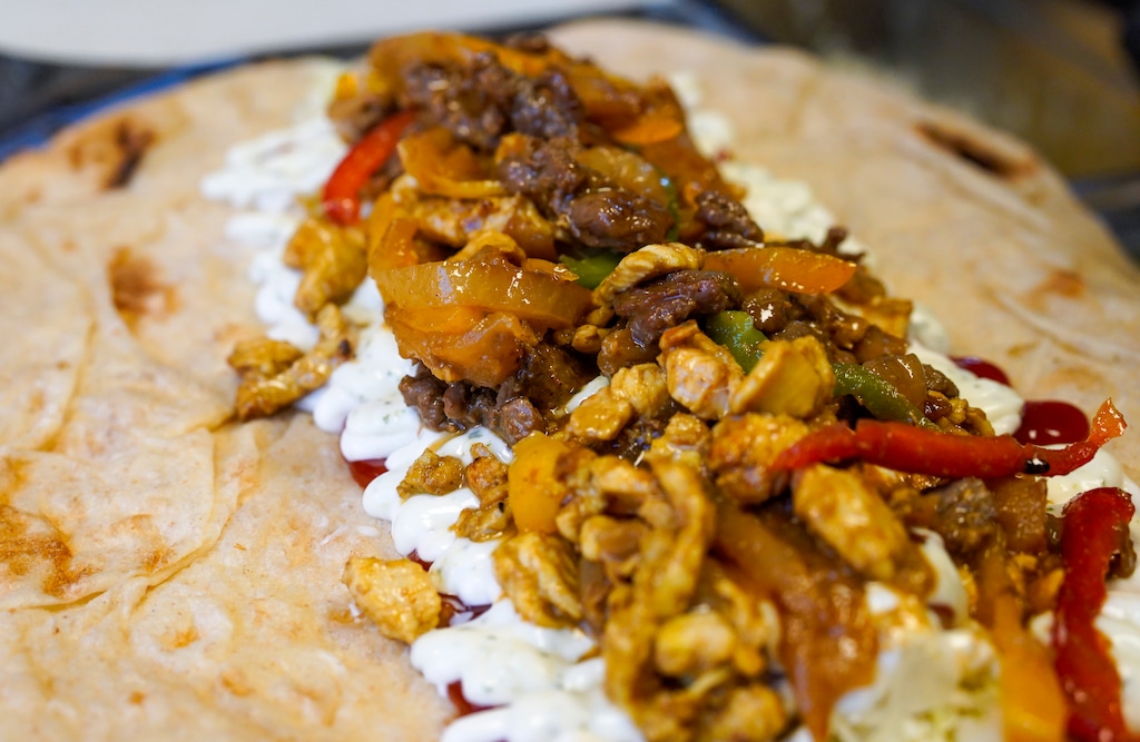 (Chris Samuels | The Salt Lake Tribune) An enrollado at Caracas Dog, a Venezuelan street food establishment at Woodbine Food Hall in Salt Lake City, Monday, Oct. 20, 2025.