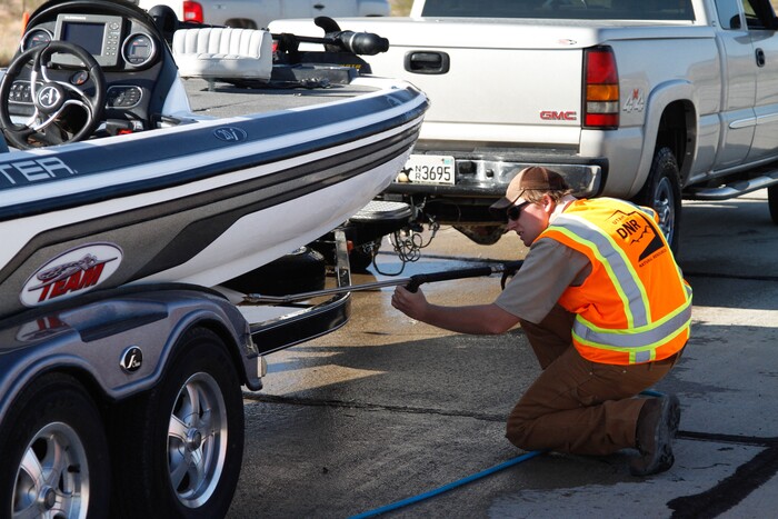(Courtesy DWR) Decontaminating boats that posed a threat to Deer Creek Reservoir is among the reasons the reservoir doesn't have mussels in it.  (This photo was taken at Sand Hollow Reservoir in 2010.)
