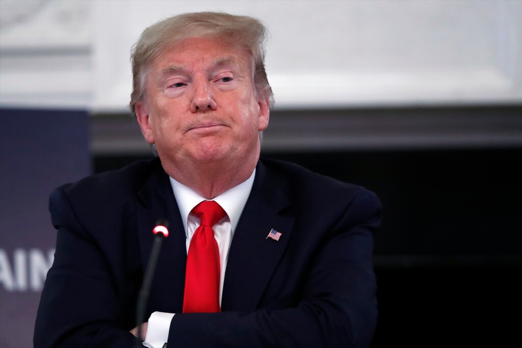 (Alex Brandon | AP file photo)  President Donald Trump listens during a roundtable with industry executives about reopening country after the coronavirus closures, in the State Dining Room of the White House, Friday, May 29, 2020, in Washington.