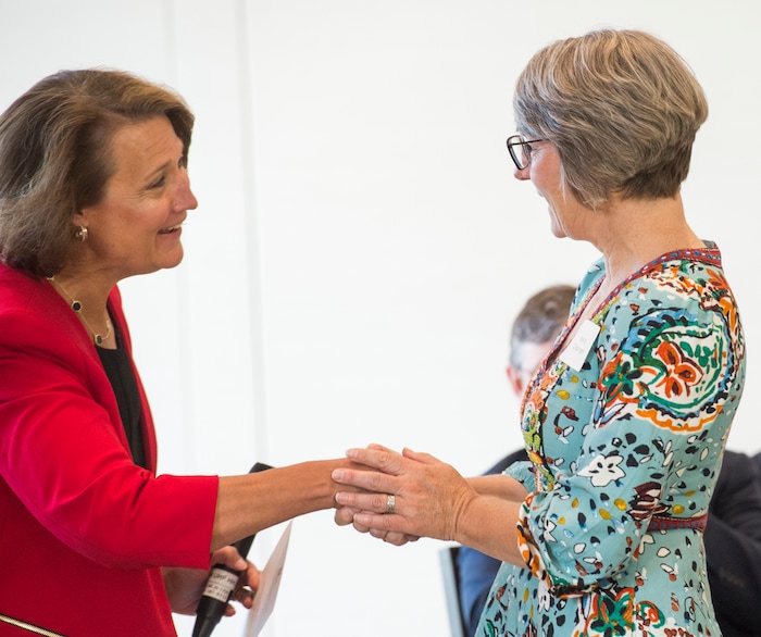 (Rick Egan  |  The Salt Lake Tribune)     University of Utah President Ruth V. Watkins greets Wendy Chapman as the University of Utah named Chapman and five other new Jon M. Huntsman Presidential Chairs, funded by the Huntsman Family Foundation, during a ceremony at the Alumni House, Tuesday, June 19, 2018.


