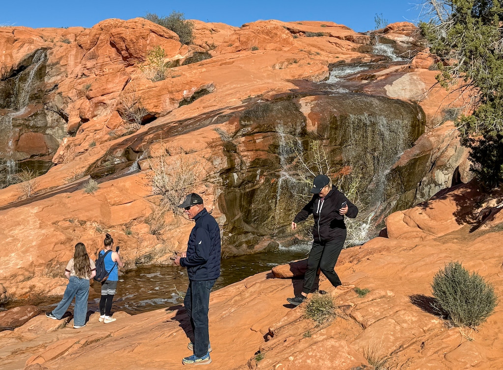 (Mark Eddington | The Salt Lake Tribune) People explore the Gunlock State Park Waterfalls near Gunlock, Wednesday, March 11, 2026.