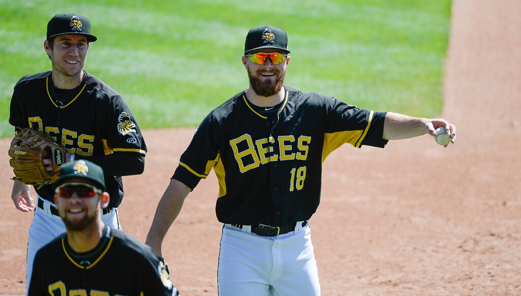 (Francisco Kjolseth  |  The Salt Lake Tribune)  Jared Walsh (No. 18) is prompted for a ball by the school children attending the Salt Lake Bees' game May 2 at Smith's Ballpark. Walsh is now with the Los Angeles Angels, as a first baseman and pitcher.