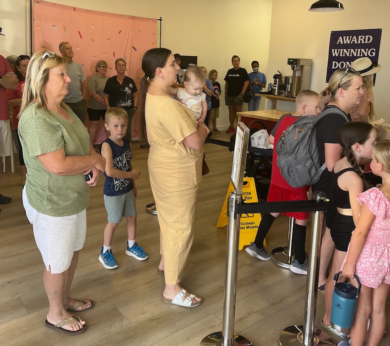 (Stefene Russell  |  The Salt Lake Tribune) Long lines of customers form during the first week in business for Banbury Cross Donuts' second location, in Centerville.