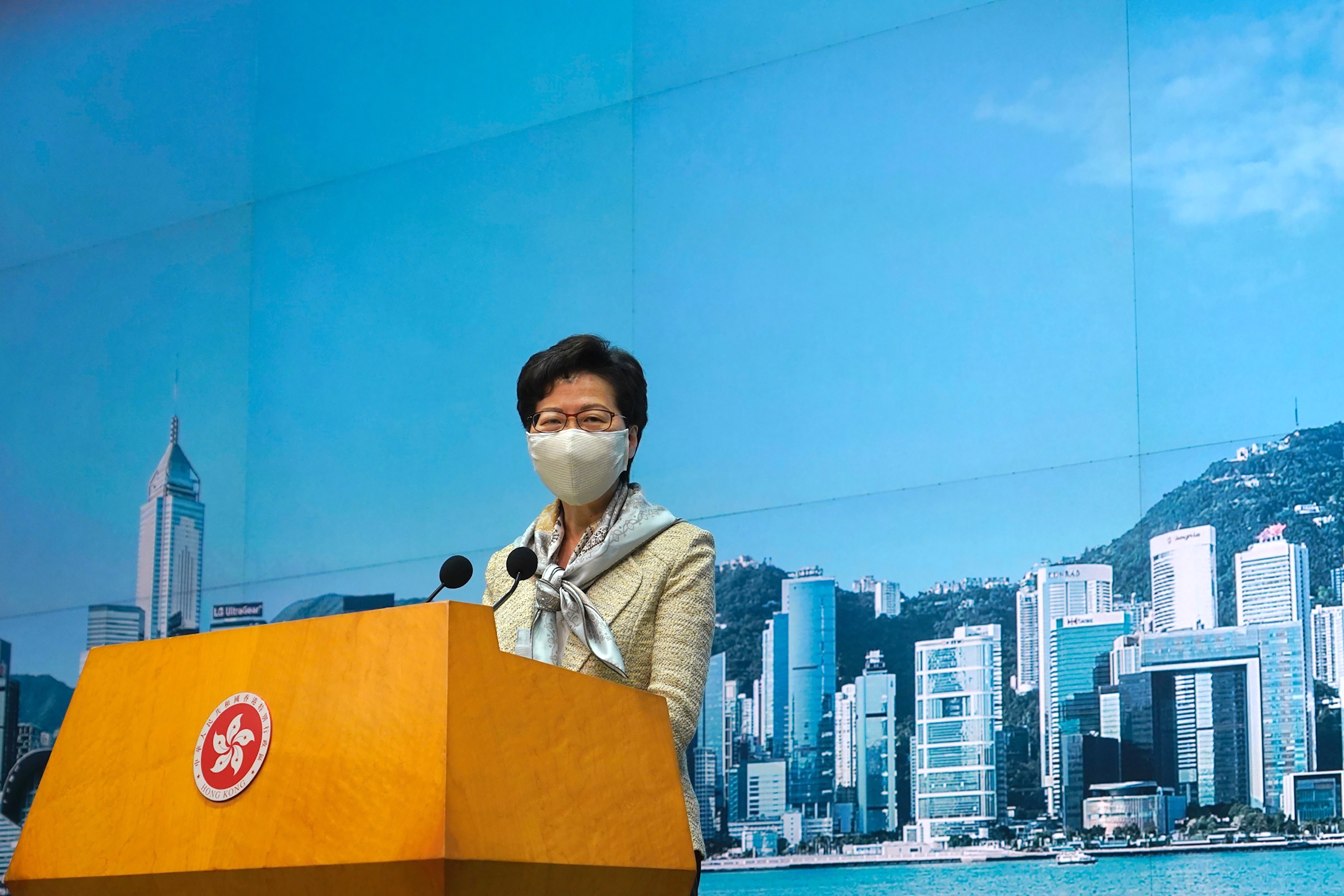 (Vincent Yu | The Associated Press) Hong Kong Chief Executive Carrie Lam listens to reporters' questions during a press conference in Hong Kong, Tuesday, June 30, 2020. Hong Kong media are reporting that China has approved a contentious law that would allow authorities to crack down on subversive and secessionist activity in Hong Kong, sparking fears that it would be used to curb opposition voices in the semi-autonomous territory. Lam declined to comment on the national security law at a weekly meeting with reporters, saying it was “inappropriate” for her to do so while the Standing Committee meeting was still in progress.