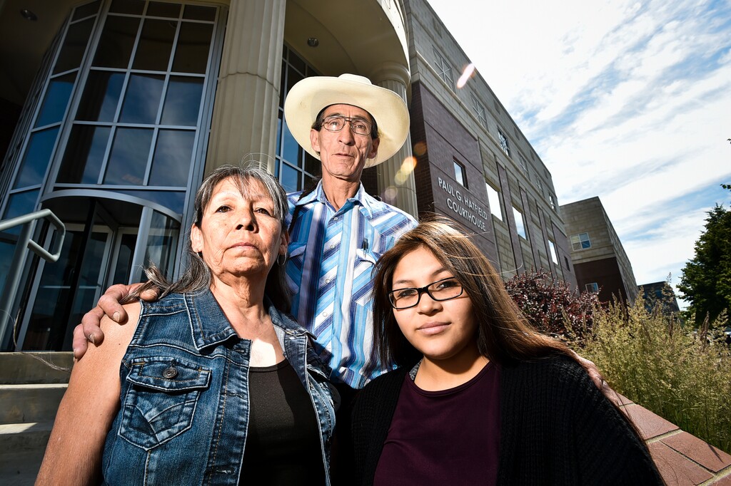 (Thom Bridge  |  Independent Record via AP)  Cletus Cole, mother, Earline Bearcrane Cole, father, and Precious Bearcrane, daughter, to Steven Bearcrane Cole, who was shot to death in 2005, stand on the steps of the Paul G. Hatfield Federal Courthouse Tuesday, July 2, 2019 after a hearing in the 10-year-old civil lawsuit questioning the FBI investigation into Bearcrane's death.