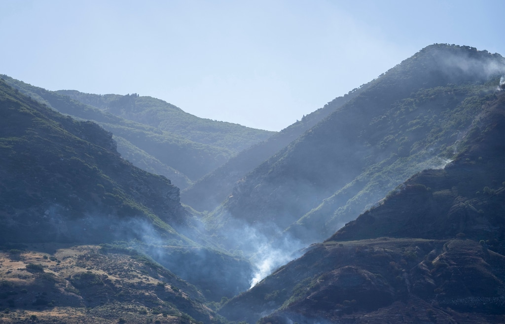 (Rick Egan | The Salt Lake Tribune) Fire in the foothills of Centerville, on Monday, July 4, 2022.