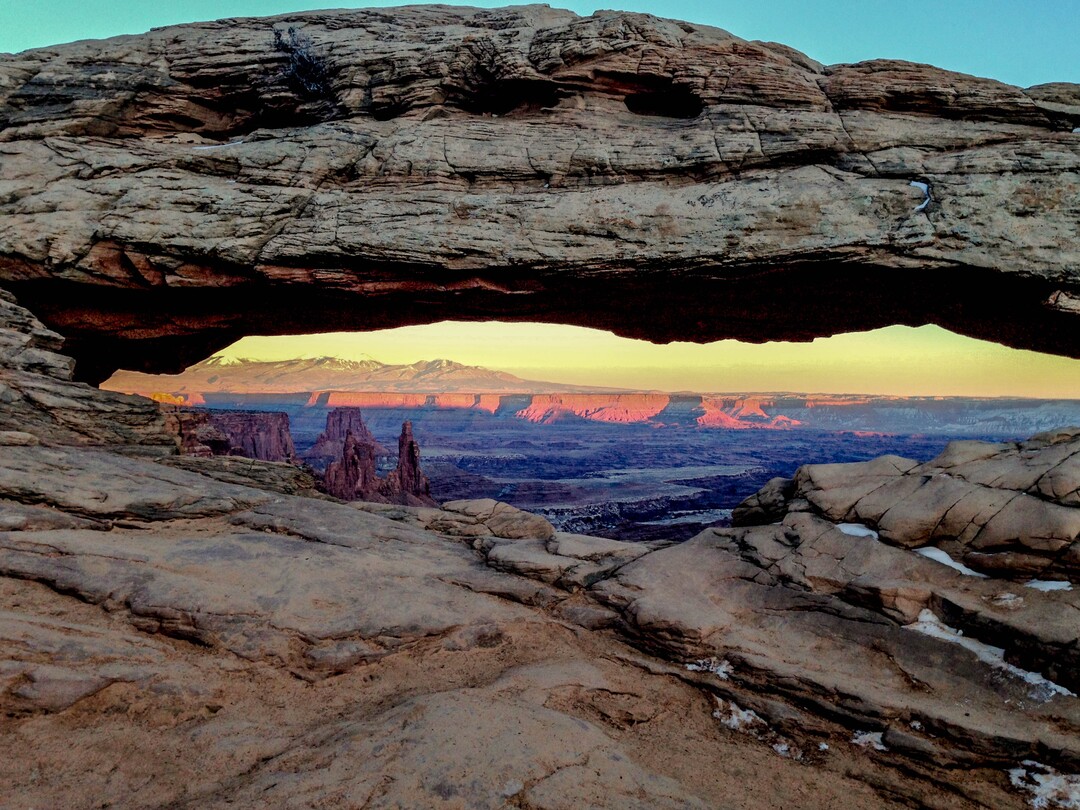 (Erin Alberty | The Salt Lake Tribune) Mesa Arch frames the canyons of the Colorado River in the late afternoon of Dec. 1, 2015 over Canyonlands National Park.
