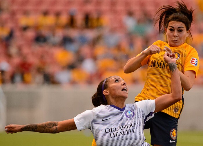 (Trent Nelson | The Salt Lake Tribune)  Utah Royals host Orlando Pride at Rio Tinto Stadium in Sandy, Wednesday May 9, 2018. Orlando Pride forward Sydney Leroux (2) and Utah Royals FC defender Brooke Elby (13).
