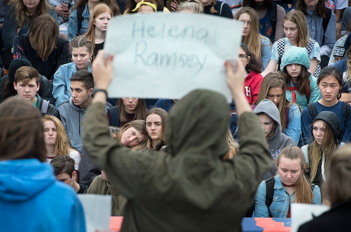 Scott Sommerdorf | The Salt Lake Tribune
Students at Brighton High observe a minute of silence for each sign held up for all of the 17 students and staff killed at Marjory Stoneman Douglas High School, during their walkout at Brighton High School, Wednesday, March 14, 2018.
