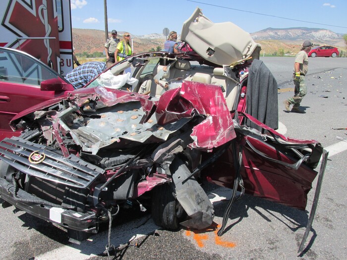 (Photo courtesy of the Utah Highway Patrol) A 69-year-old woman was seriously injured Friday in Sanpete County when her sedan crashed into a garbage truck that had run a stop sign.